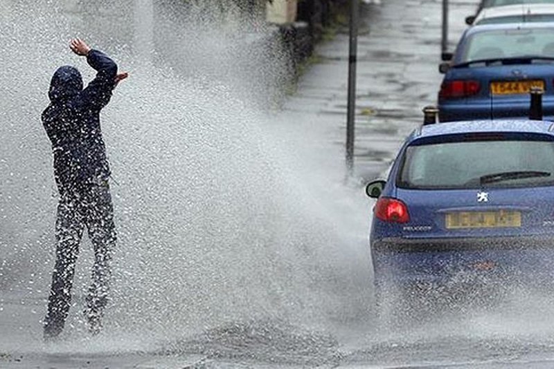 Did you know it's illegal to splash a pedestrian with your car?