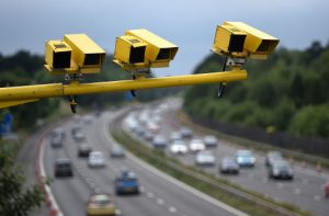 Average speed cameras use Automatic Number Plate Reading (ANPR) technology to record a date and time stamp as you pass between two cameras.