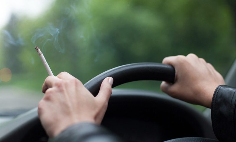 Smoking while driving could cost drivers around £2,000 when they come to sell their car