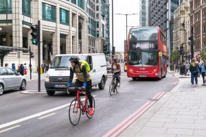 Cyclists on busy London street.