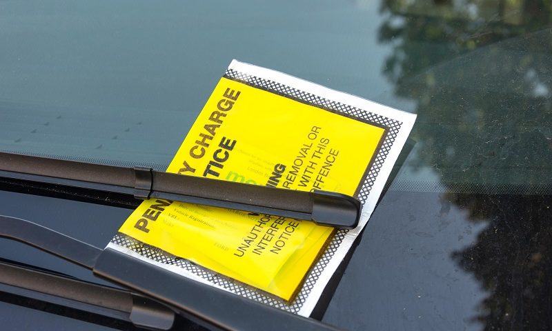 Parking fine placed on a car windscreen