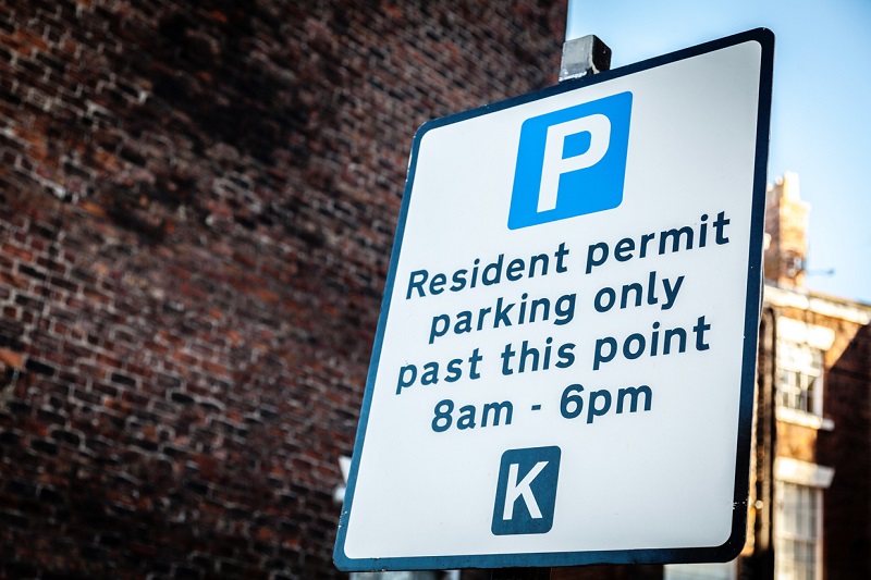 A resident permit holder only parking sign.