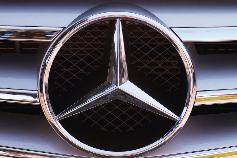 Mercedes-Benz logo on hood of car
