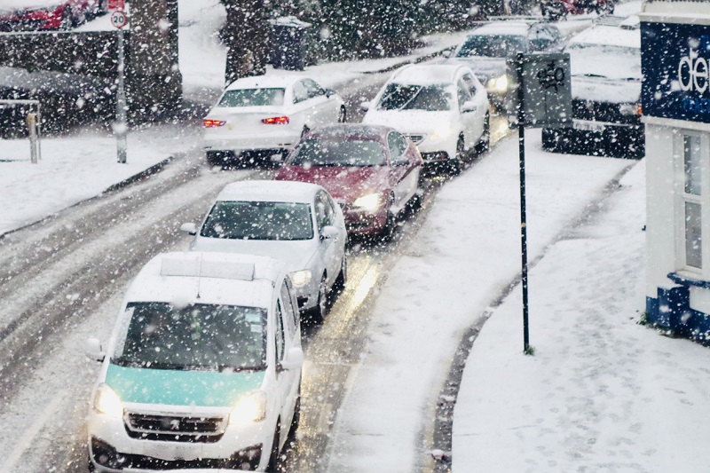 Traffic jam during heavy snowfall in Brighton.