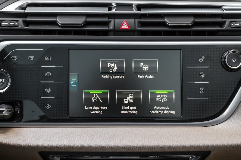 A close-up of a car display showing the safety technology