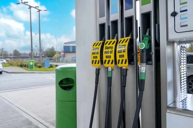 Petrol and diesel pumps at a petrol station showing out of order signs